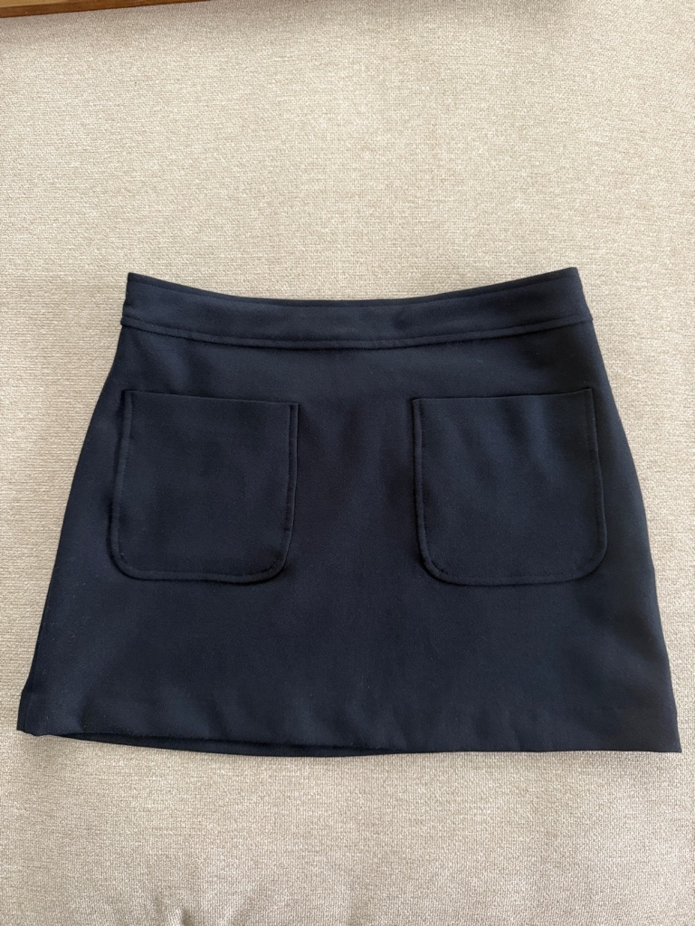Black Mini Skirt with Front Patch Pockets